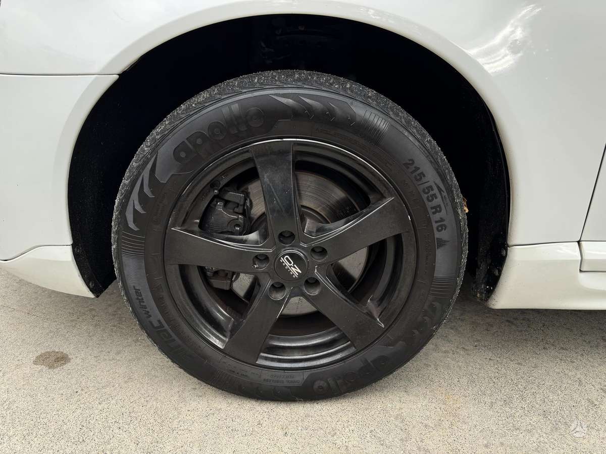 Volvo V70 2009 — photo 25