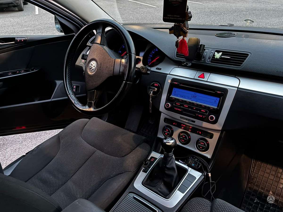 Volkswagen Passat 2009 — photo 7