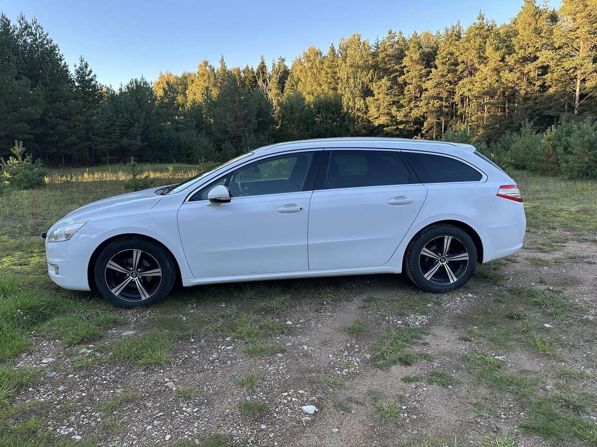 Peugeot 508 2014 — вигляд ззаду