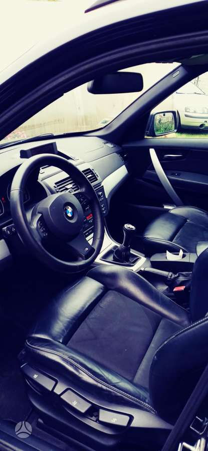 BMW X3 2009 — салон