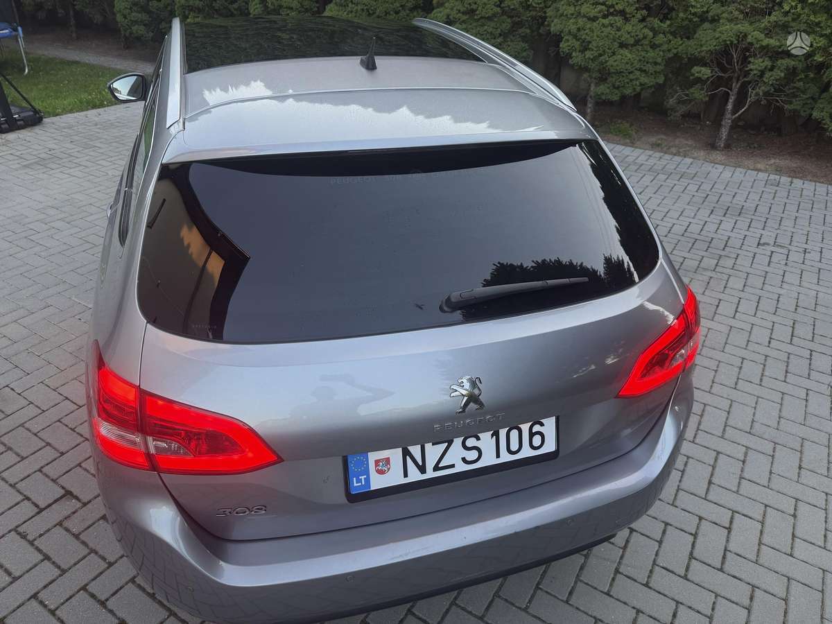 Peugeot 308 2014 — photo 11
