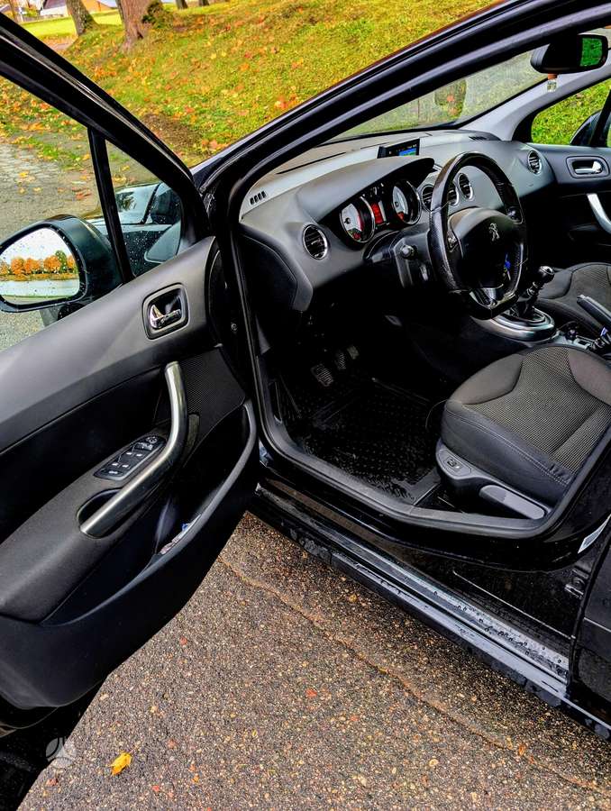 Peugeot 308 2013 — photo 9