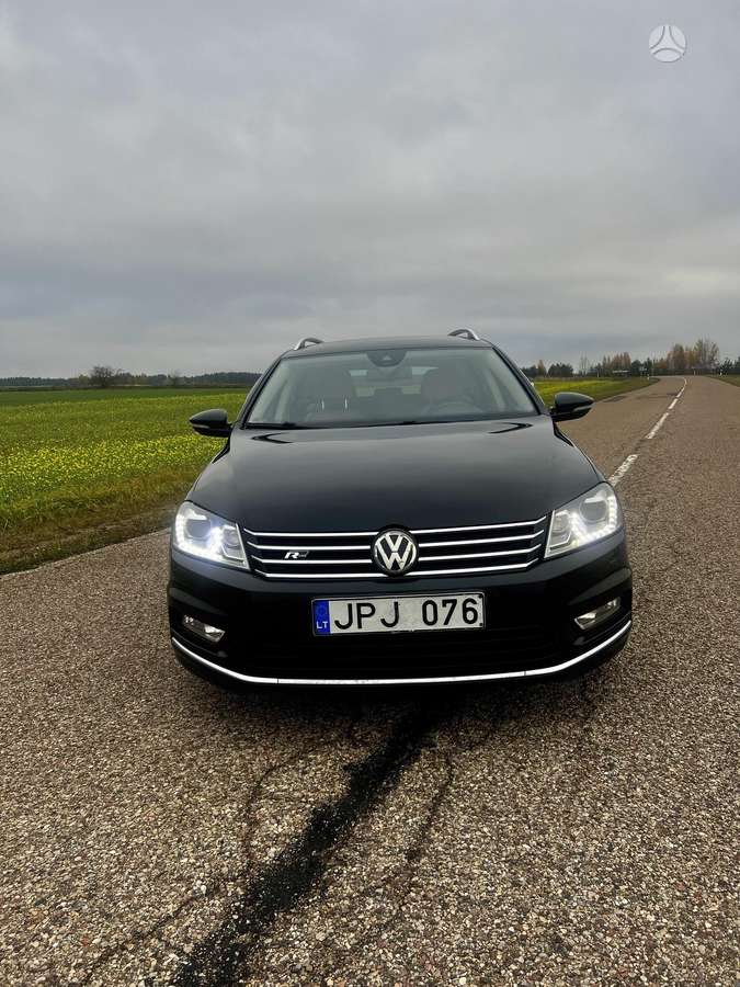 Volkswagen Passat 2014 — вигляд ззаду