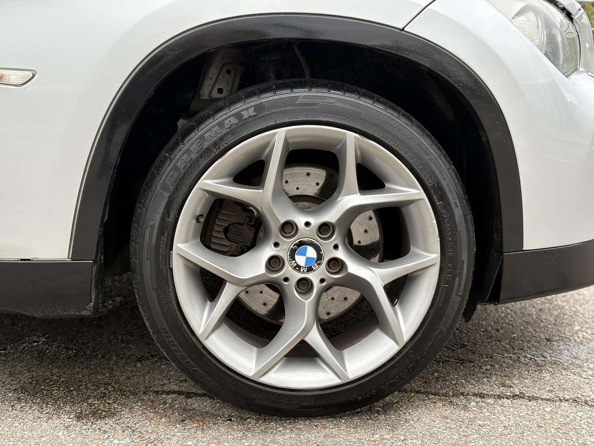 BMW X1 2010 — photo 7