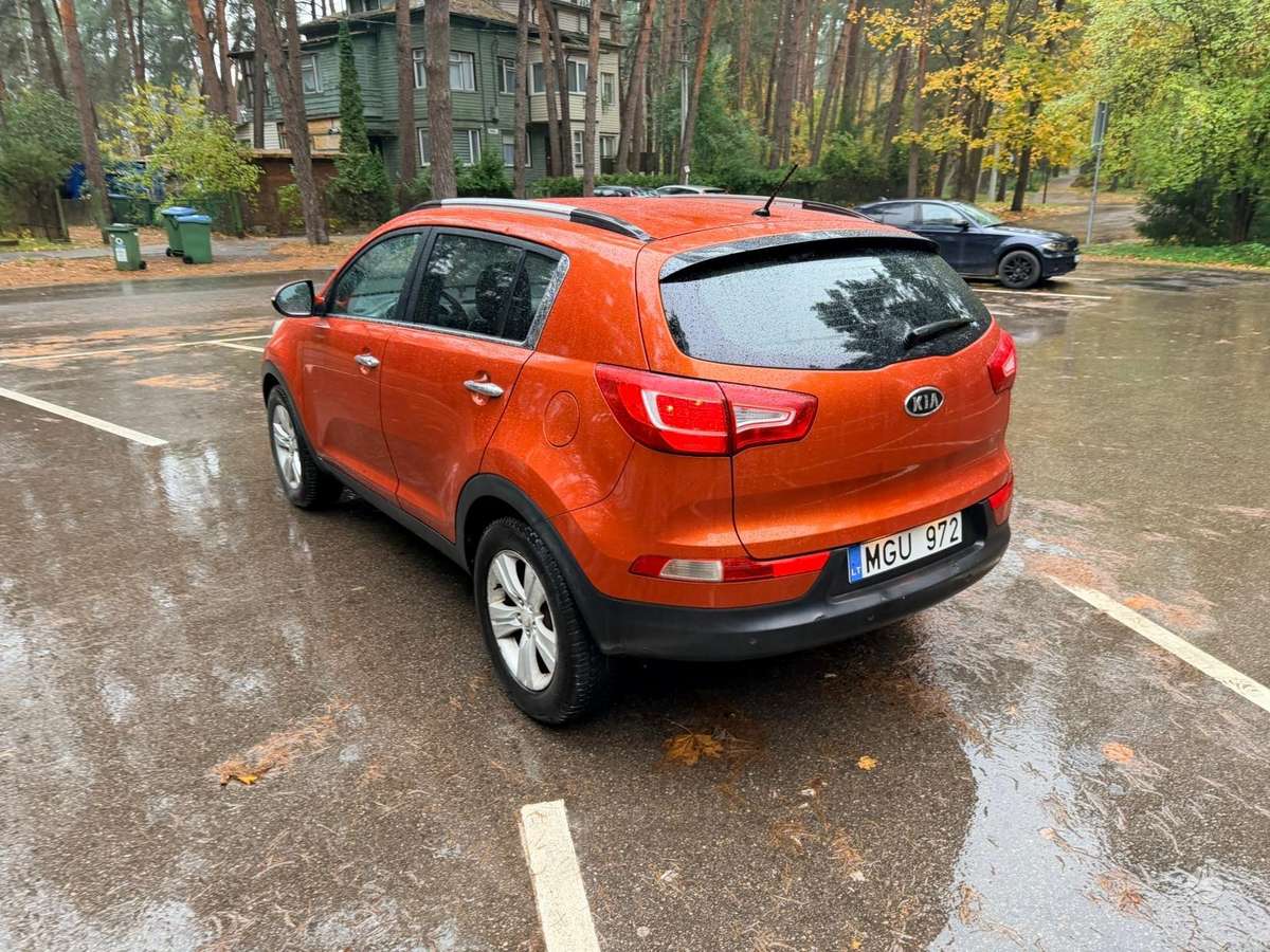 Kia Sportage 2011 — engine 1685 cm³, 116 HP (85kW)