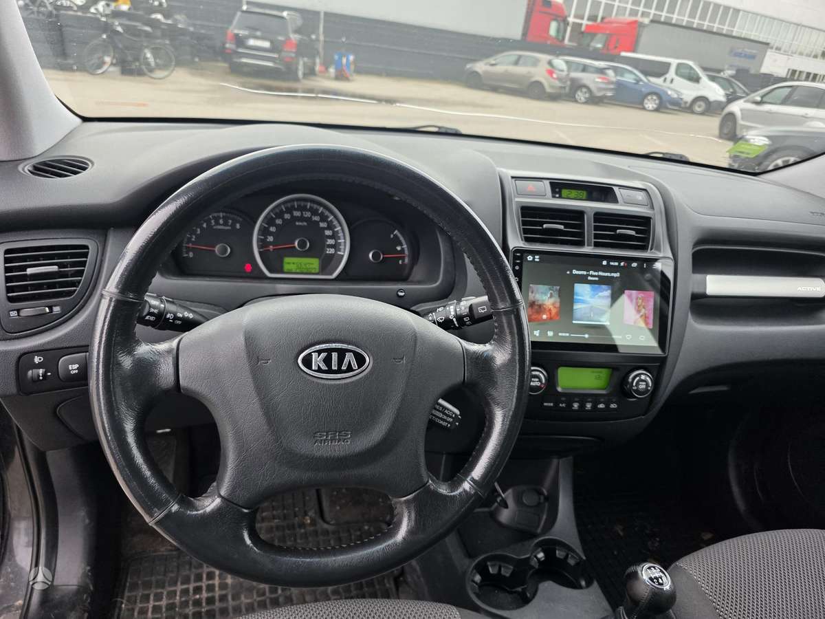 Kia Sportage 2009 — photo 19