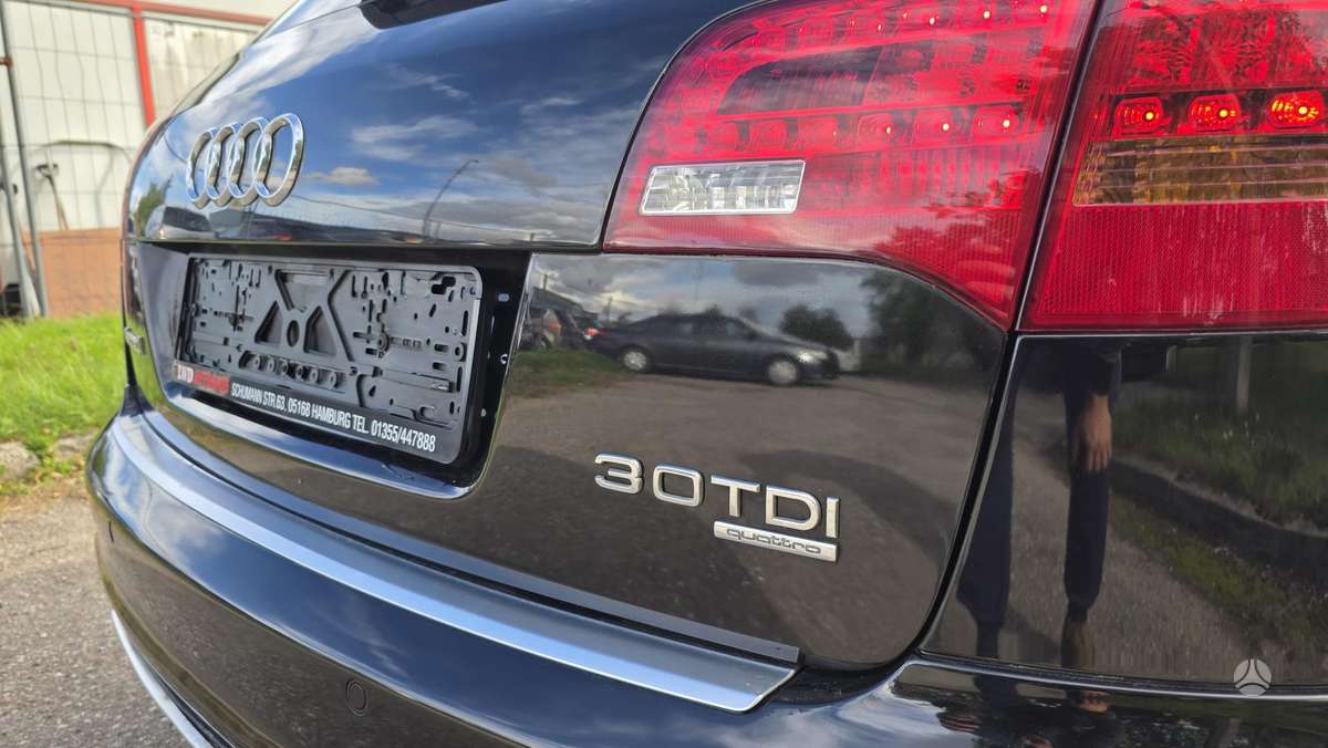 Audi A6 2009 — photo 21