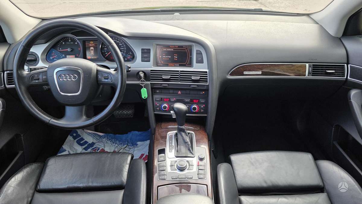 Audi A6 2009 — photo 22