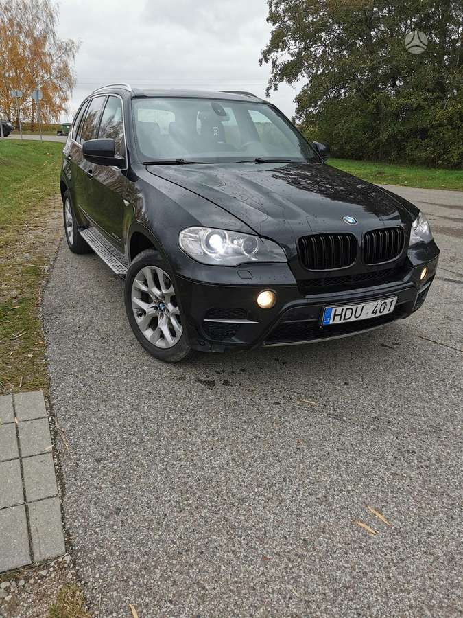 BMW X5 2010 — photo 7