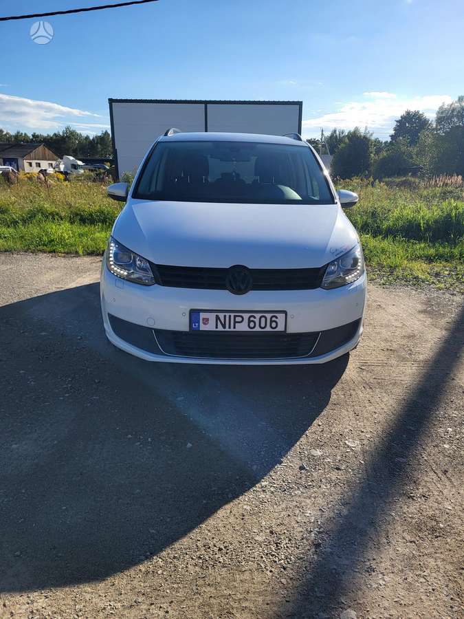 Volkswagen Touran 2014 — engine 1600 cm³, 105 HP (77kW)