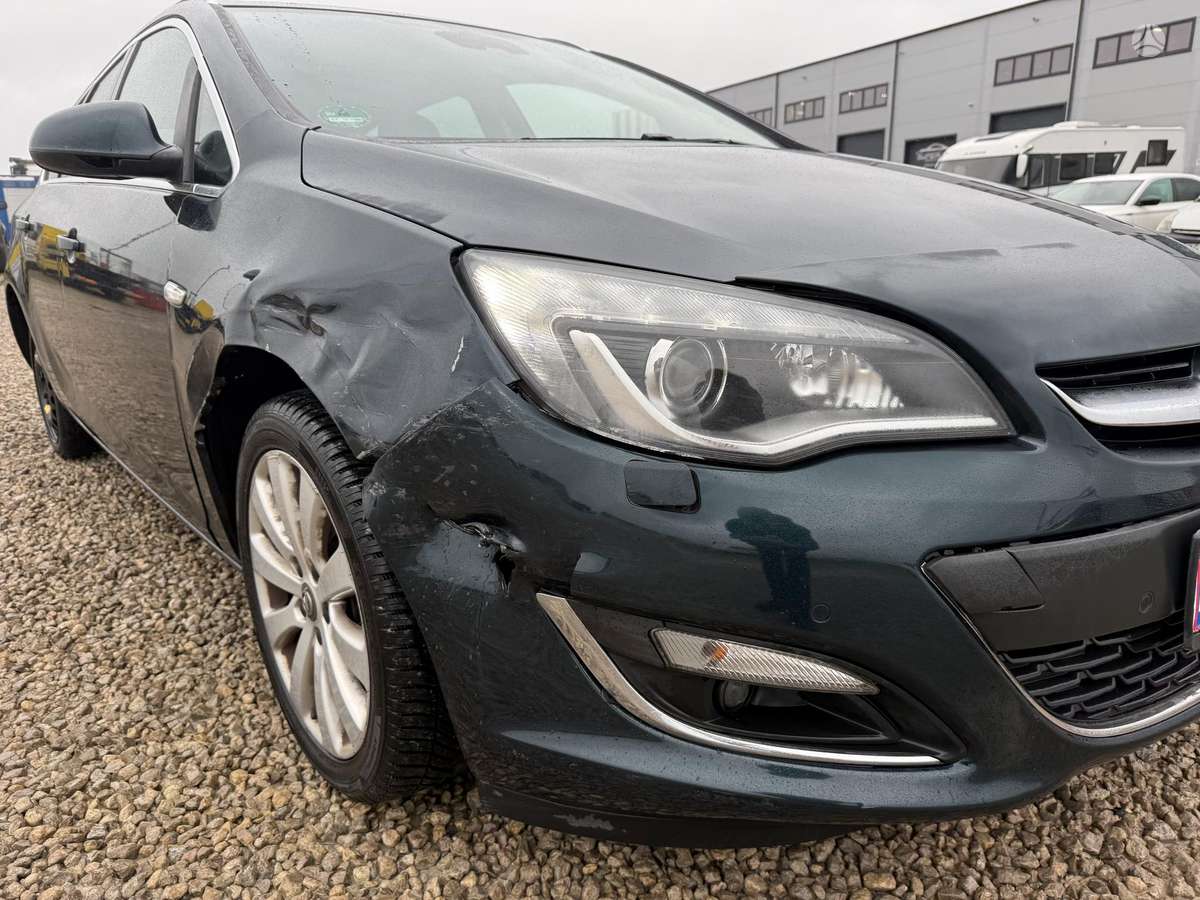 Opel Astra 2015 — фото 11