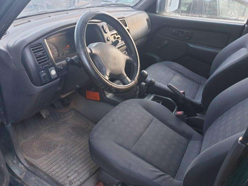 Mitsubishi L200 2005 — photo 8