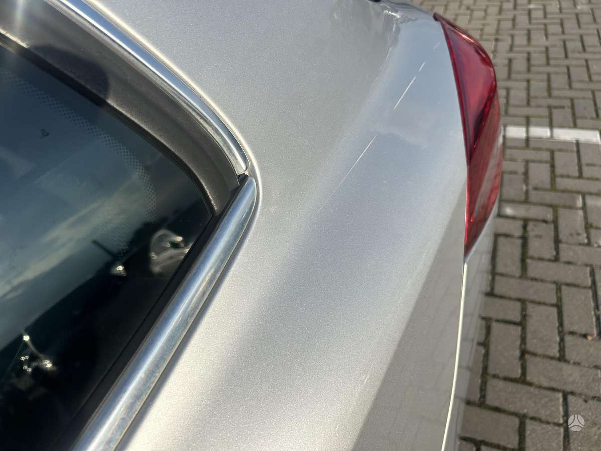 Renault Laguna 2013 — photo 11