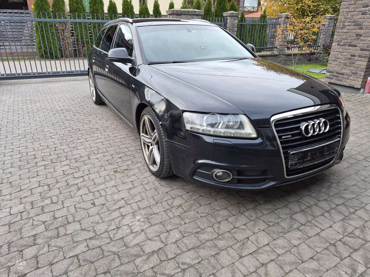 Audi A6 2010 — салон