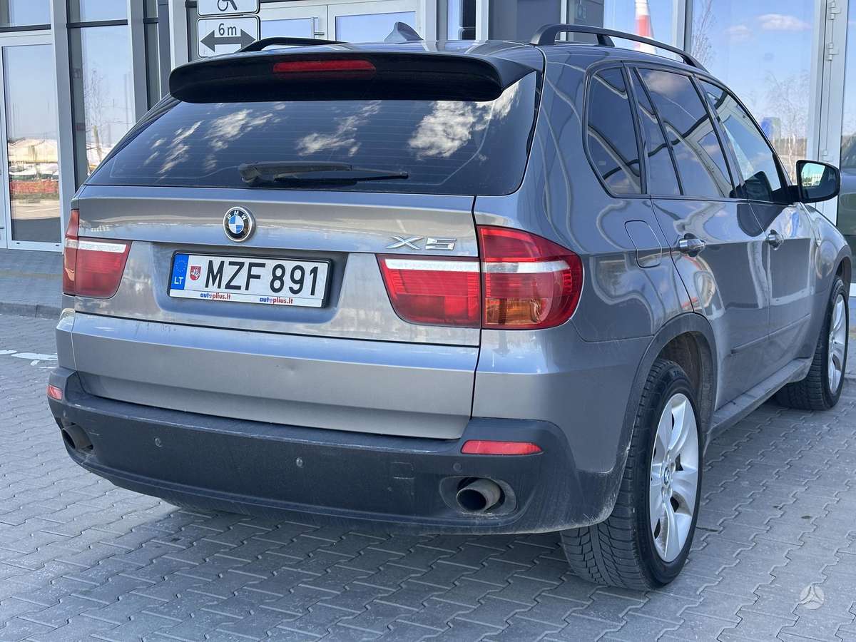 BMW X5 2009 — engine 2993 cm³, 235 HP (173kW)