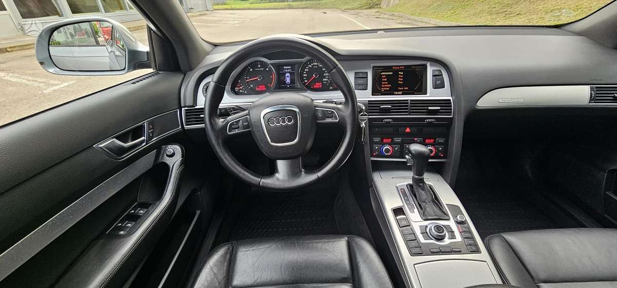 Audi A6 2009 — photo 24