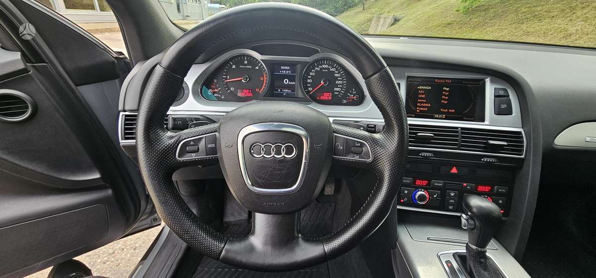 Audi A6 2009 — photo 25