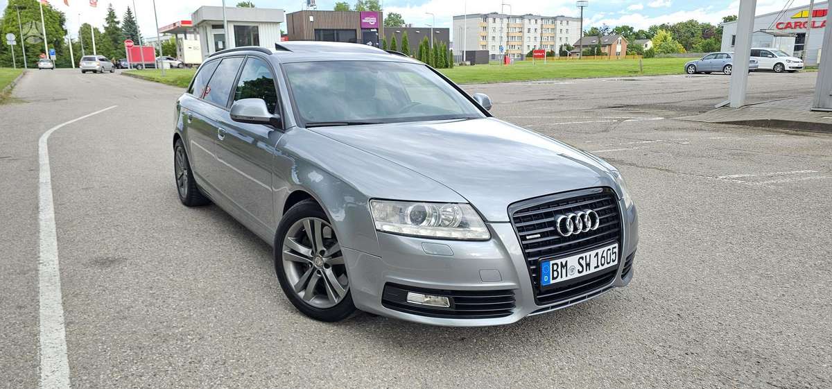 Audi A6 2009 — engine 3000 cm³, 239 HP (176kW)