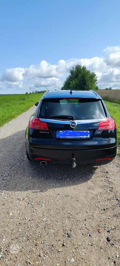 Opel Insignia 2009 — вигляд ззаду