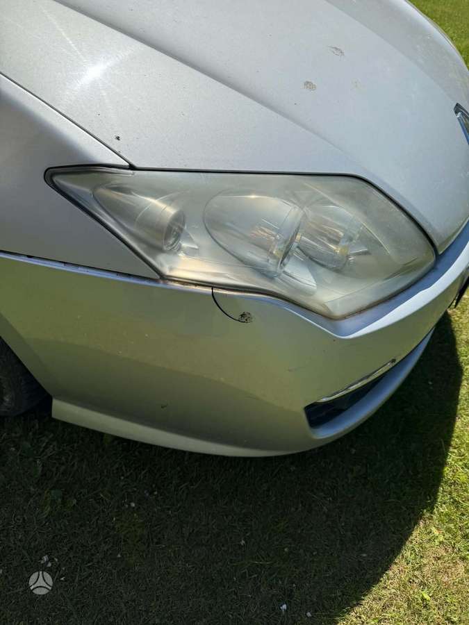 Renault Laguna 2008 — photo 12