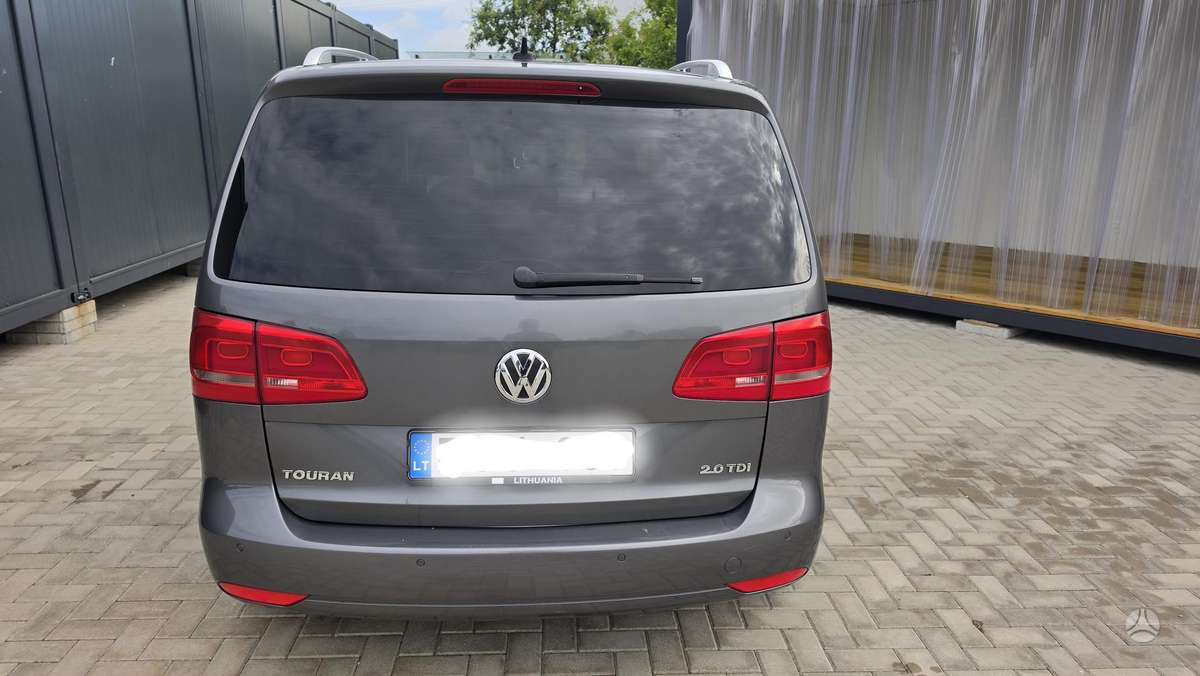 Volkswagen Touran 2011 — engine 1968 cm³, 170 HP (125kW)