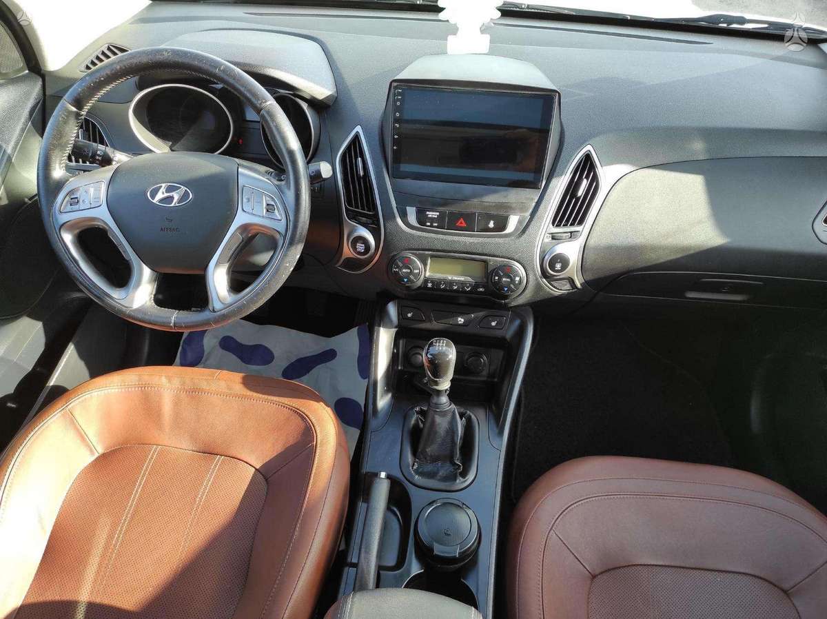 Hyundai ix35 2011 — photo 16