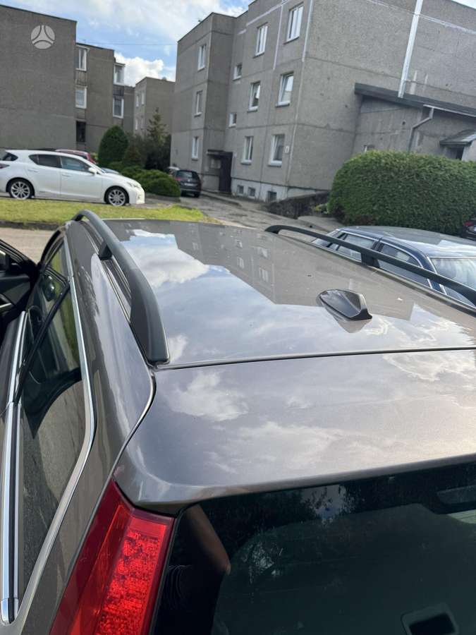 Volvo V70 2009 — photo 18