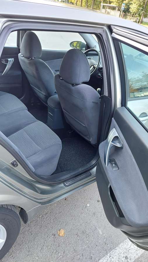 Nissan Primera 2004 — photo 13
