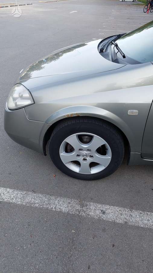 Nissan Primera 2004 — photo 5