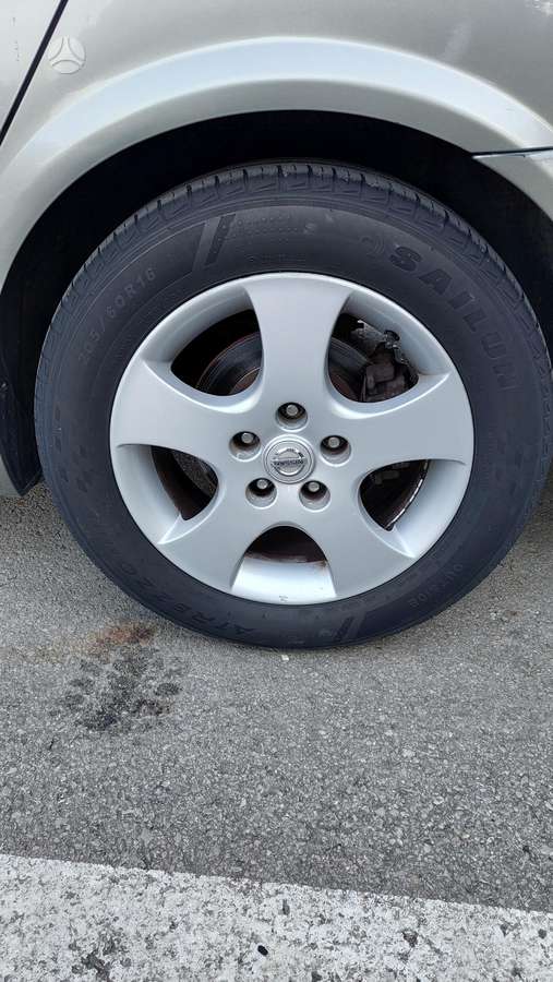 Nissan Primera 2004 — photo 7