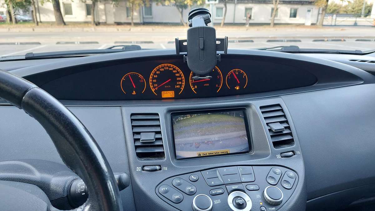Nissan Primera 2004 — photo 8