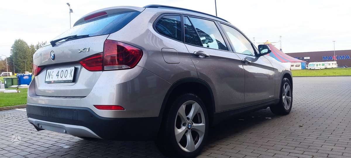 BMW X1 2012 — engine 2000 cm³, 163 HP (120kW)