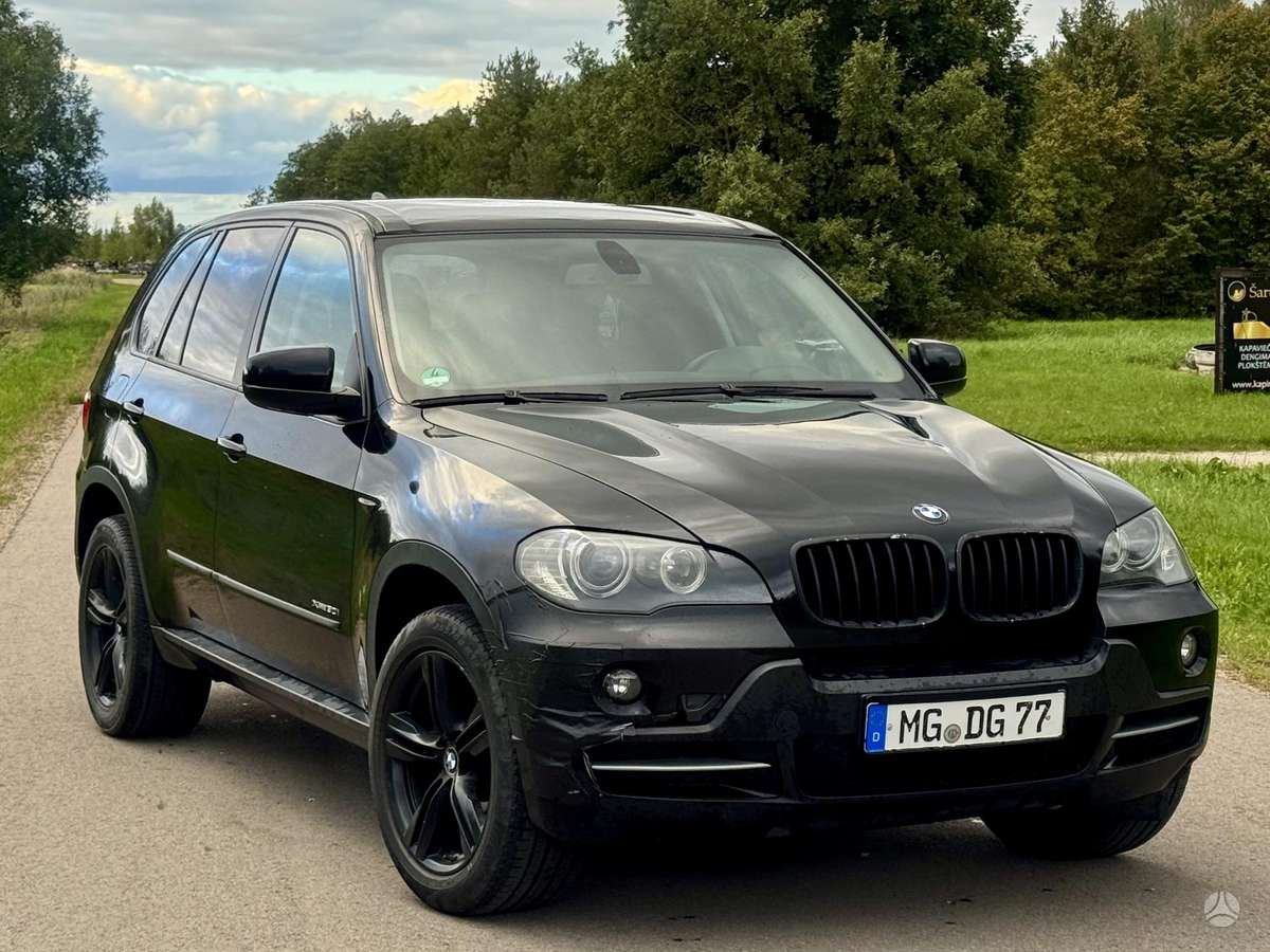 BMW X5 2009 — engine 3000 cm³, 272 HP (200kW)