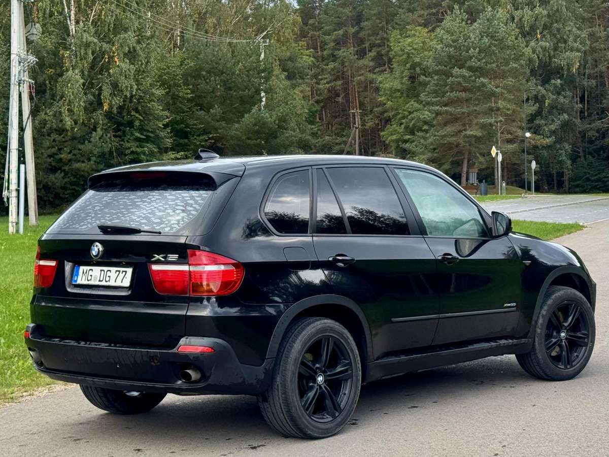 BMW X5 2009 — photo 7