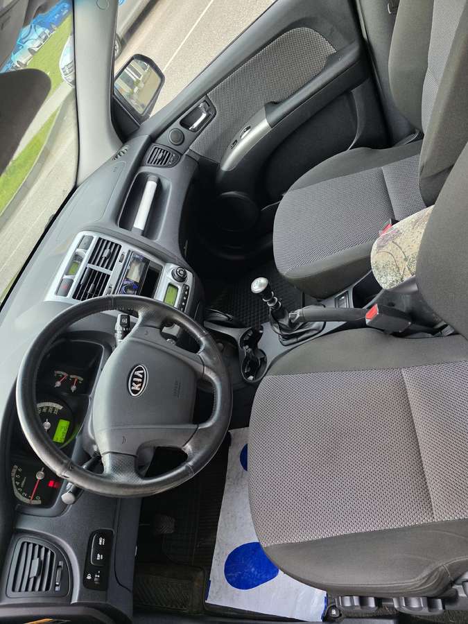 Kia Sportage 2008 — фото 11