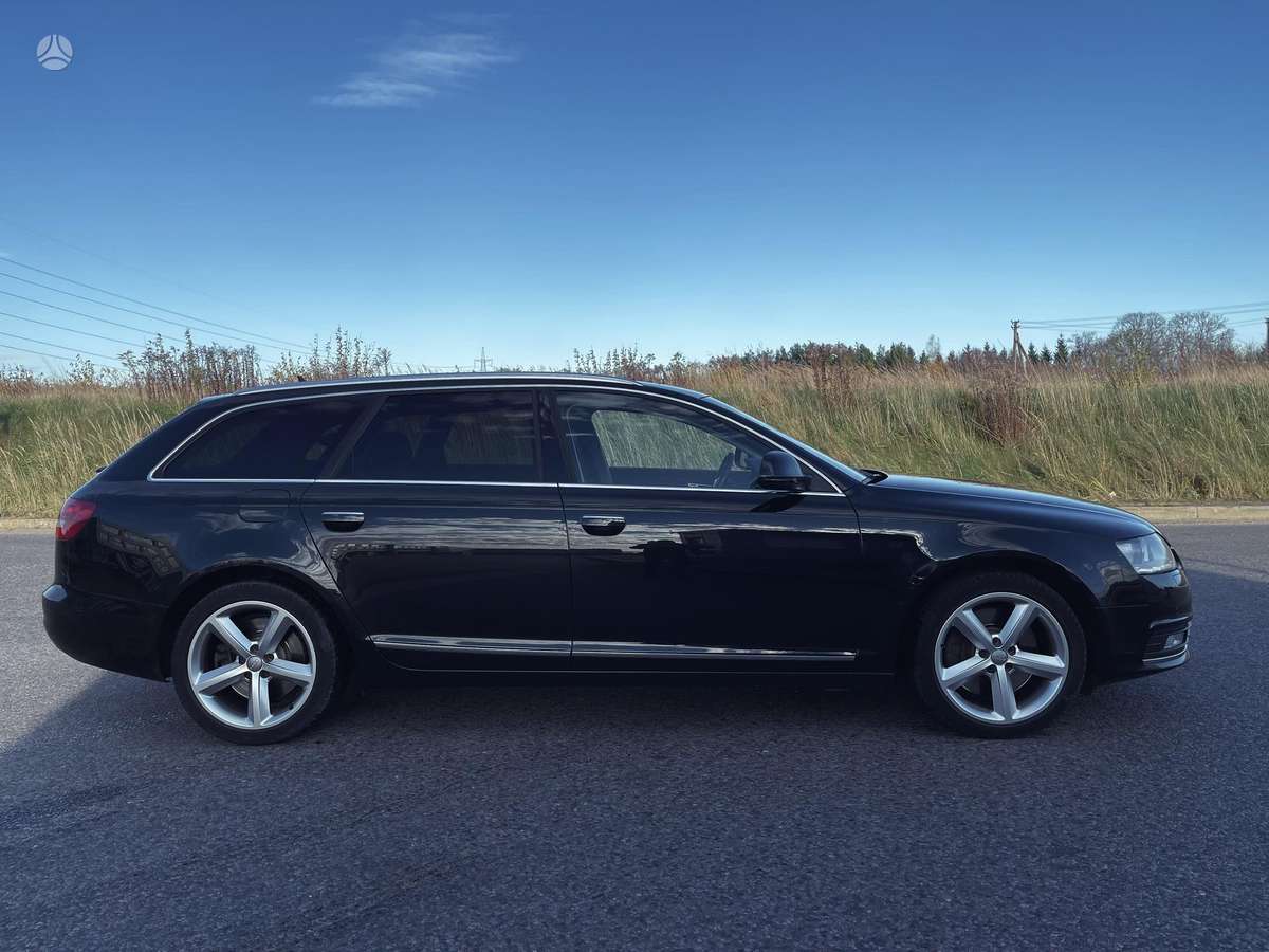 Audi A6 2009 — салон