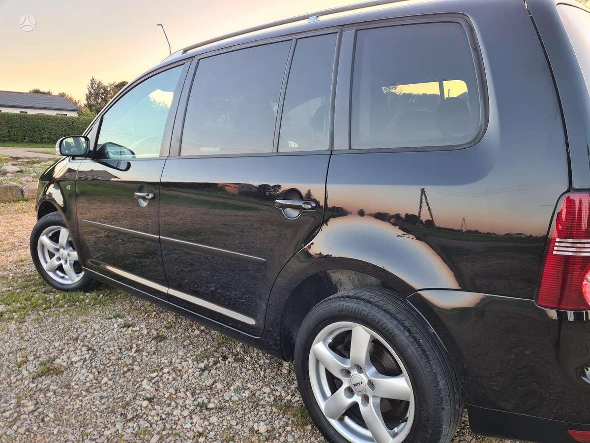 Volkswagen Touran 2009 — photo 31