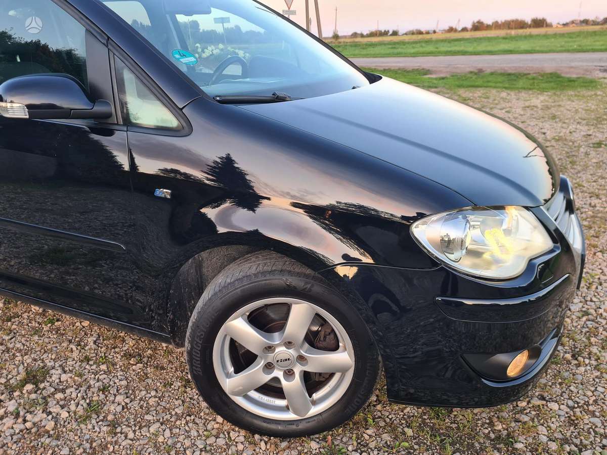 Volkswagen Touran 2009 — photo 35