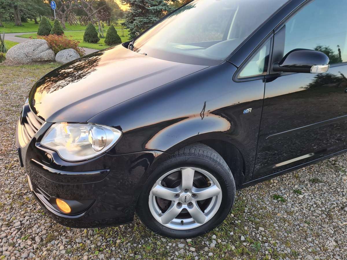 Volkswagen Touran 2009 — photo 36