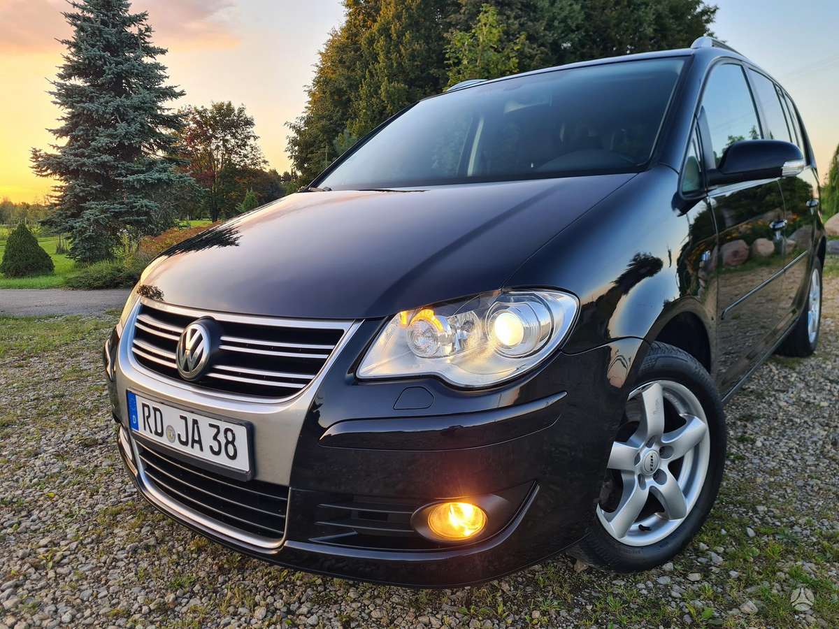 Volkswagen Touran 2009 — photo 39