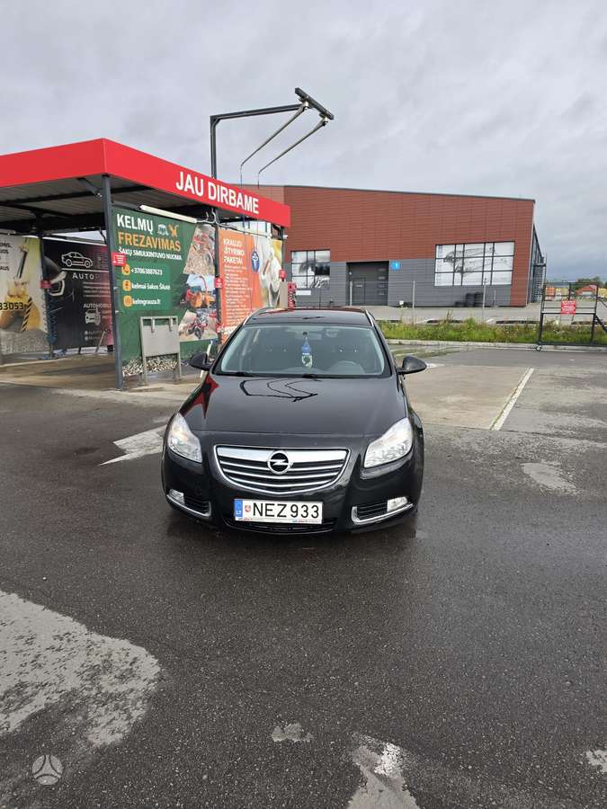 Opel Insignia 2009 — вигляд ззаду