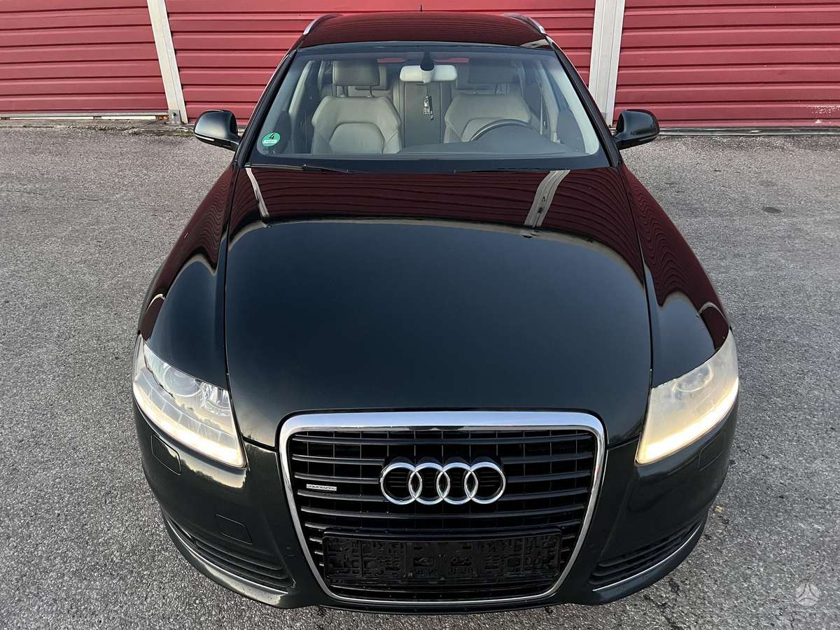 Audi A6 2009 — engine 2998 cm³, 239 HP (176kW)