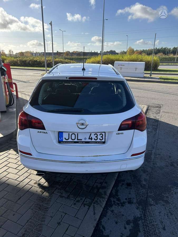 Opel Astra 2013 — engine 1956 cm³, 165 HP (121kW)
