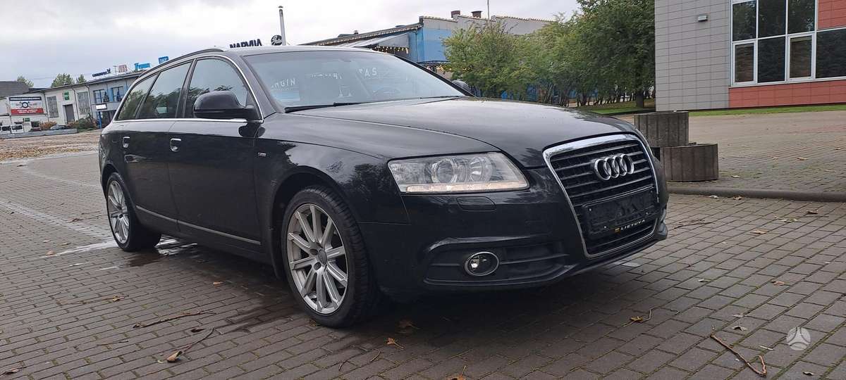 Audi A6 2010 — вигляд ззаду