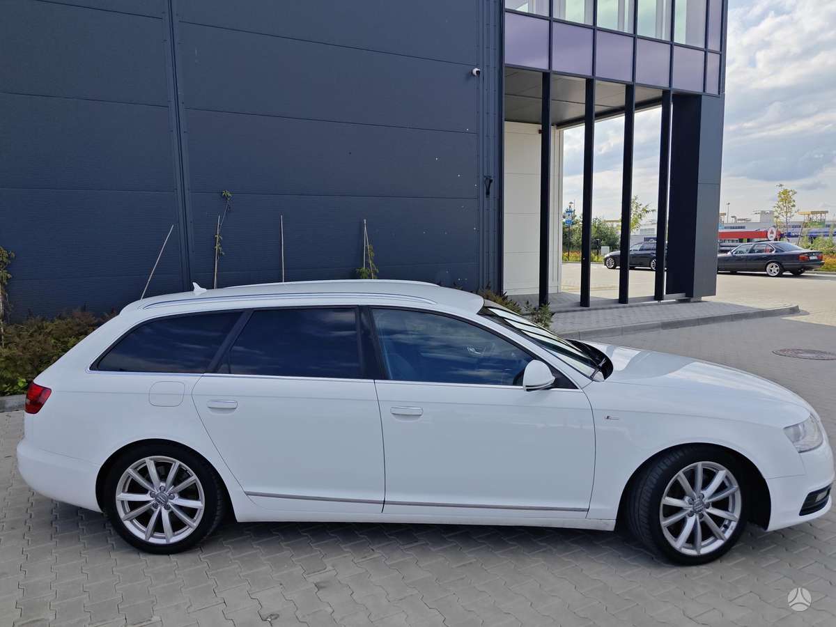 Audi A6 2009 — engine 2967 cm³, 239 HP (176kW)