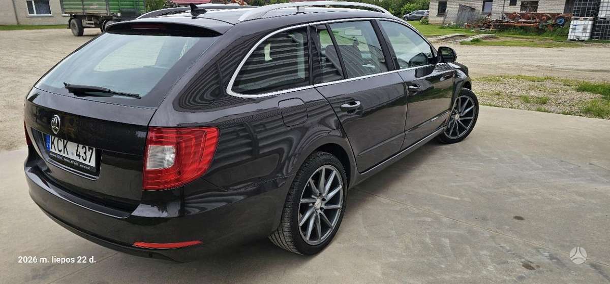 Skoda Superb 2011 — photo 15