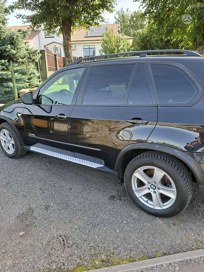 BMW X5 2009 — rear view