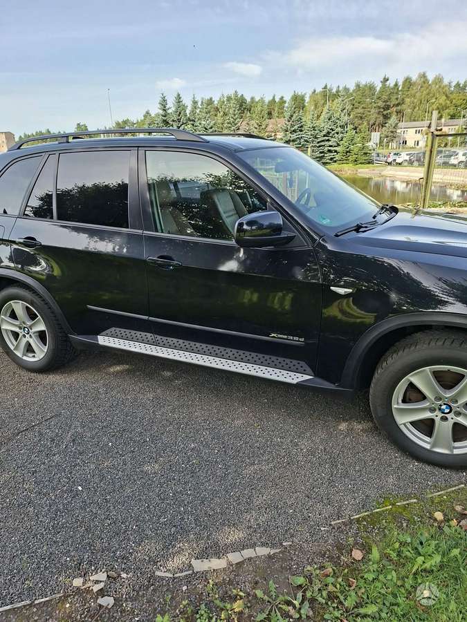 BMW X5 2009 — engine 2993 cm³, 286 HP (210kW)