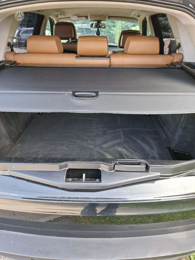 BMW X5 2009 — photo 8