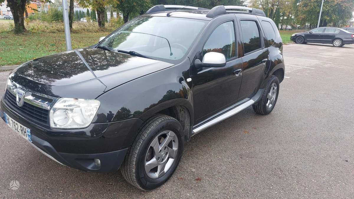Dacia Duster 2011 — салон